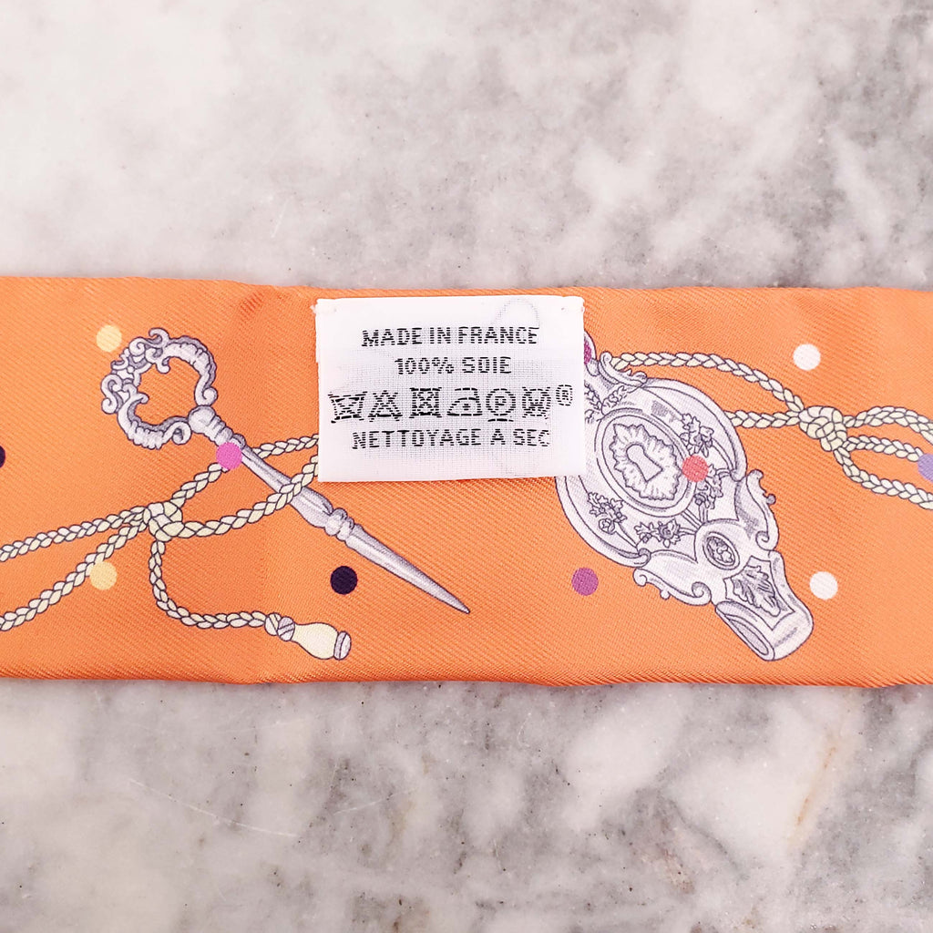 HERMÈS ORANGE PATTERNED TWILLY