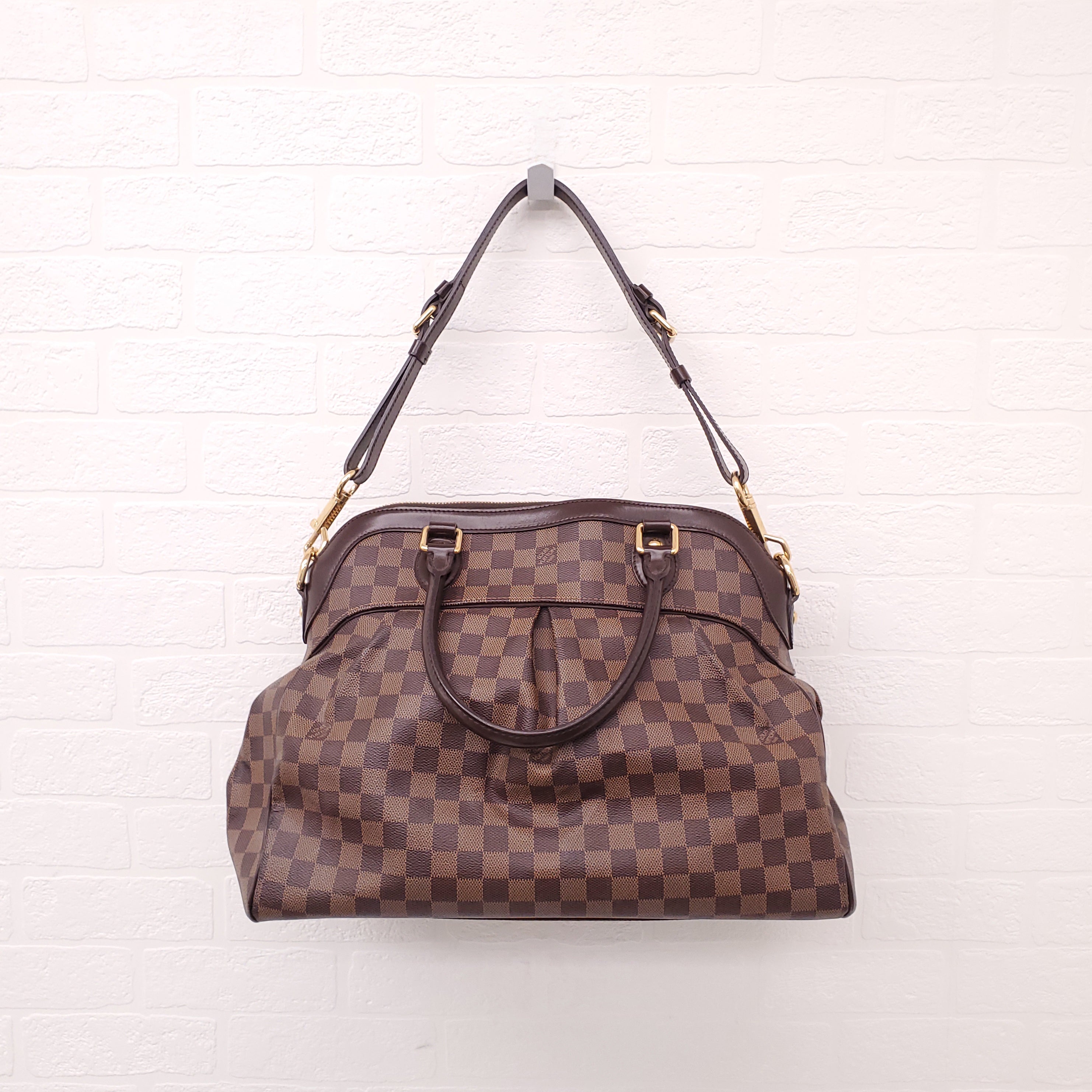 LOUIS VUITTON DAMIER EBENE TREVI PM BAG WITH BROWN LEATHER TRIM AND GOLD-TONE