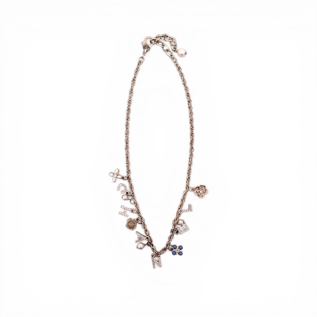 CHANEL GOLD LETTER CRYSTAL FLOWER CHAIN NECKLACE