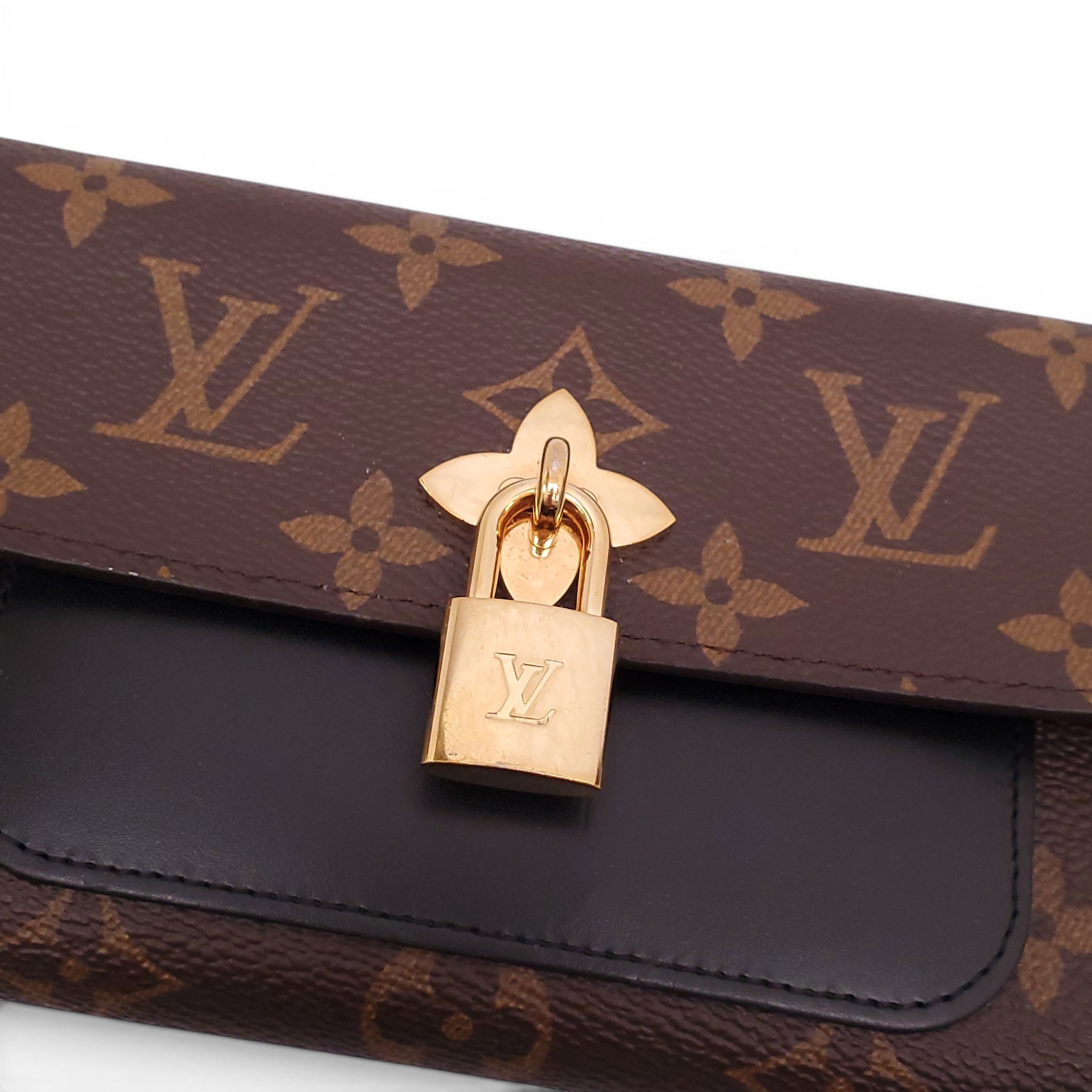 LOUIS VUITTON MONOGRAM PORTEFEUILLE WALLET WITH LOCK DETAIL