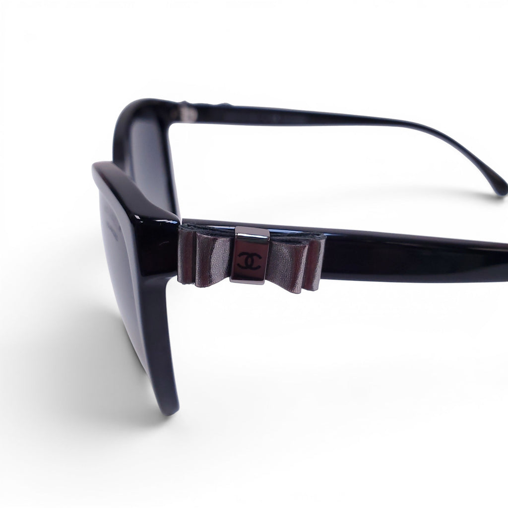 CHANEL BLACK SUNGLASSES WITH SILVER BOW LOGO DETAIL