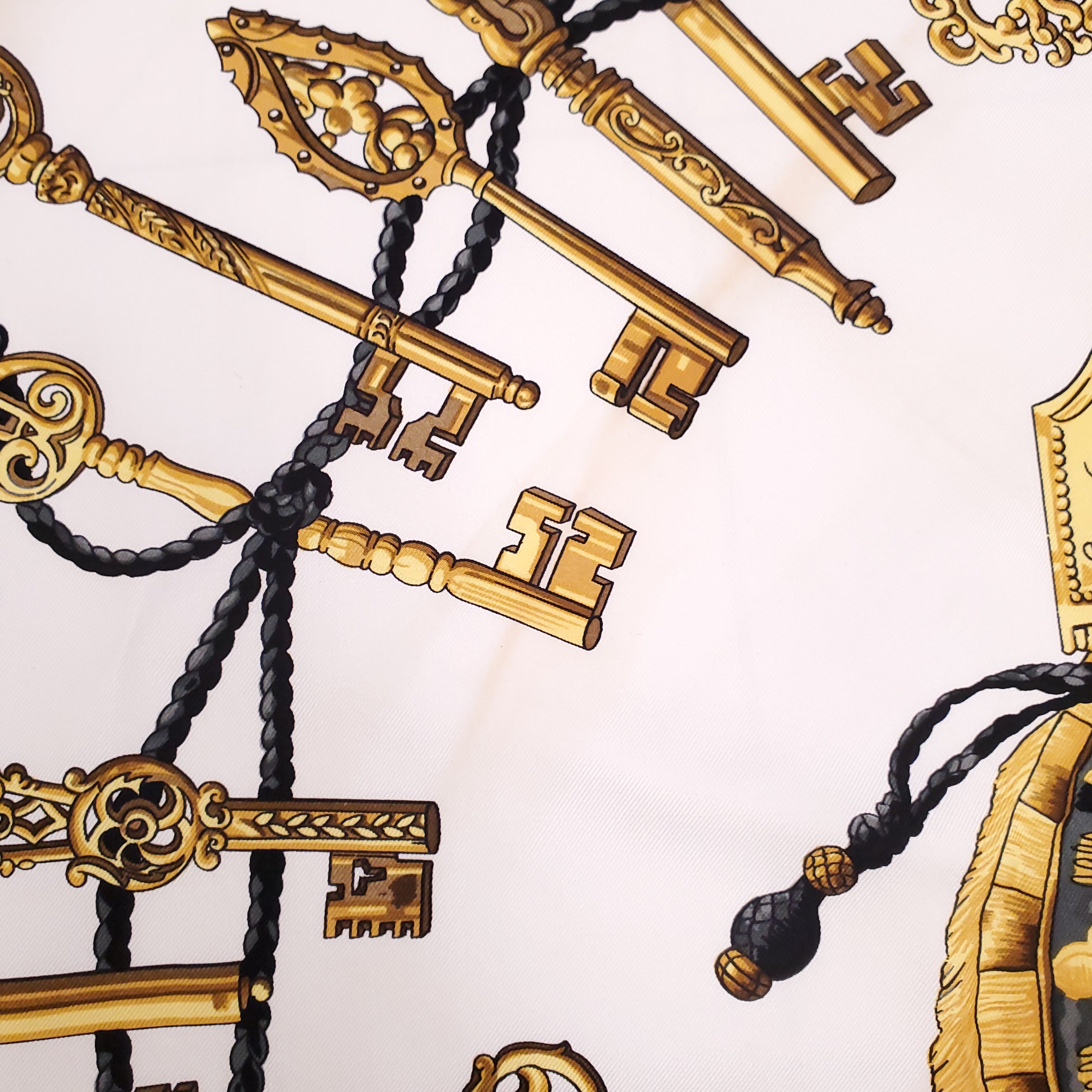 HERMÈS CREAM AND BLACK KEY PATTERNED SILK SCARF