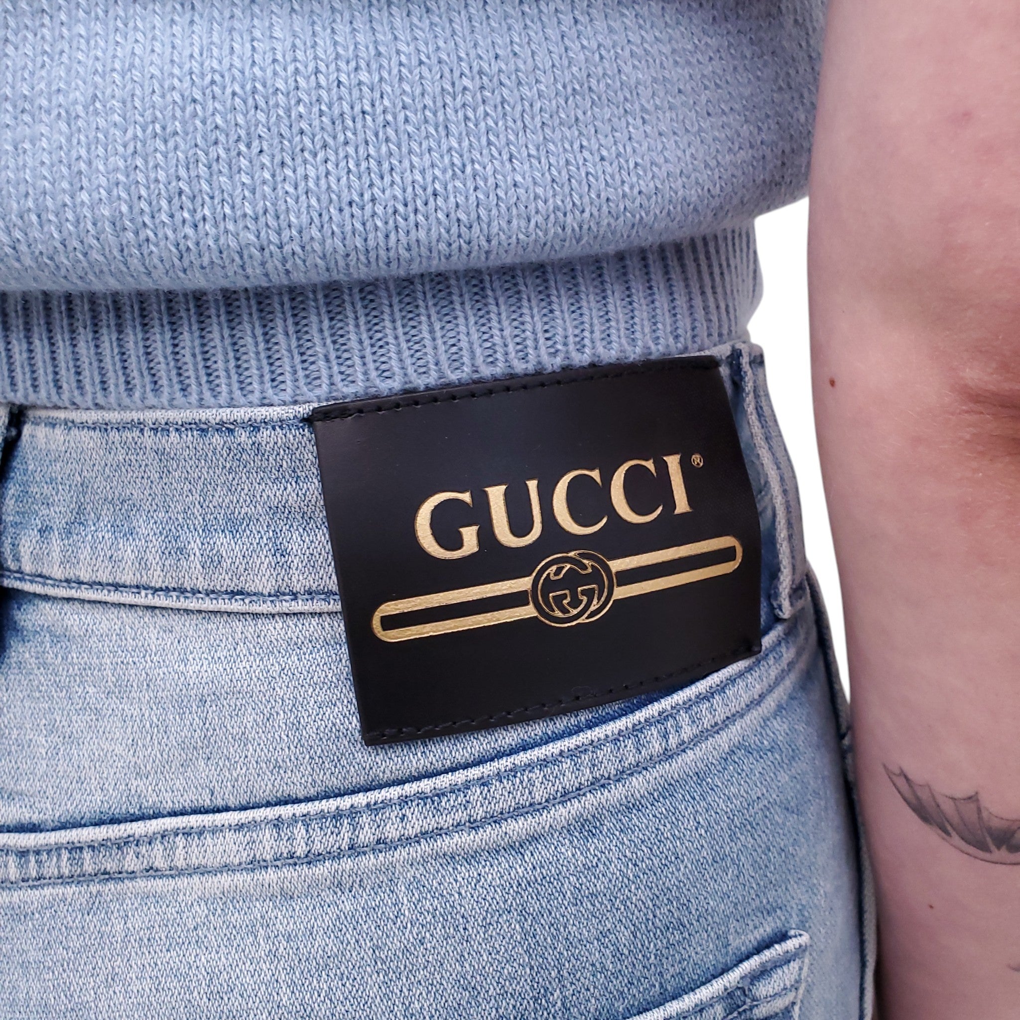 GUCCI WIDE LEG JEANS WITH LOGO PATCH - SIZE 26
