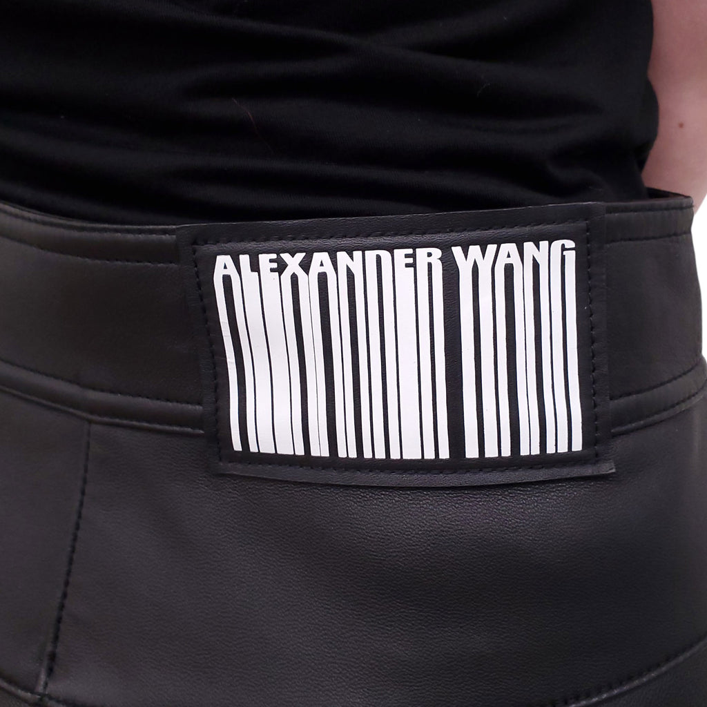 ALEXANDER WANG BLACK LOGO LEATHER PANTS WITH SILVER BUTTONS - SIZE 6