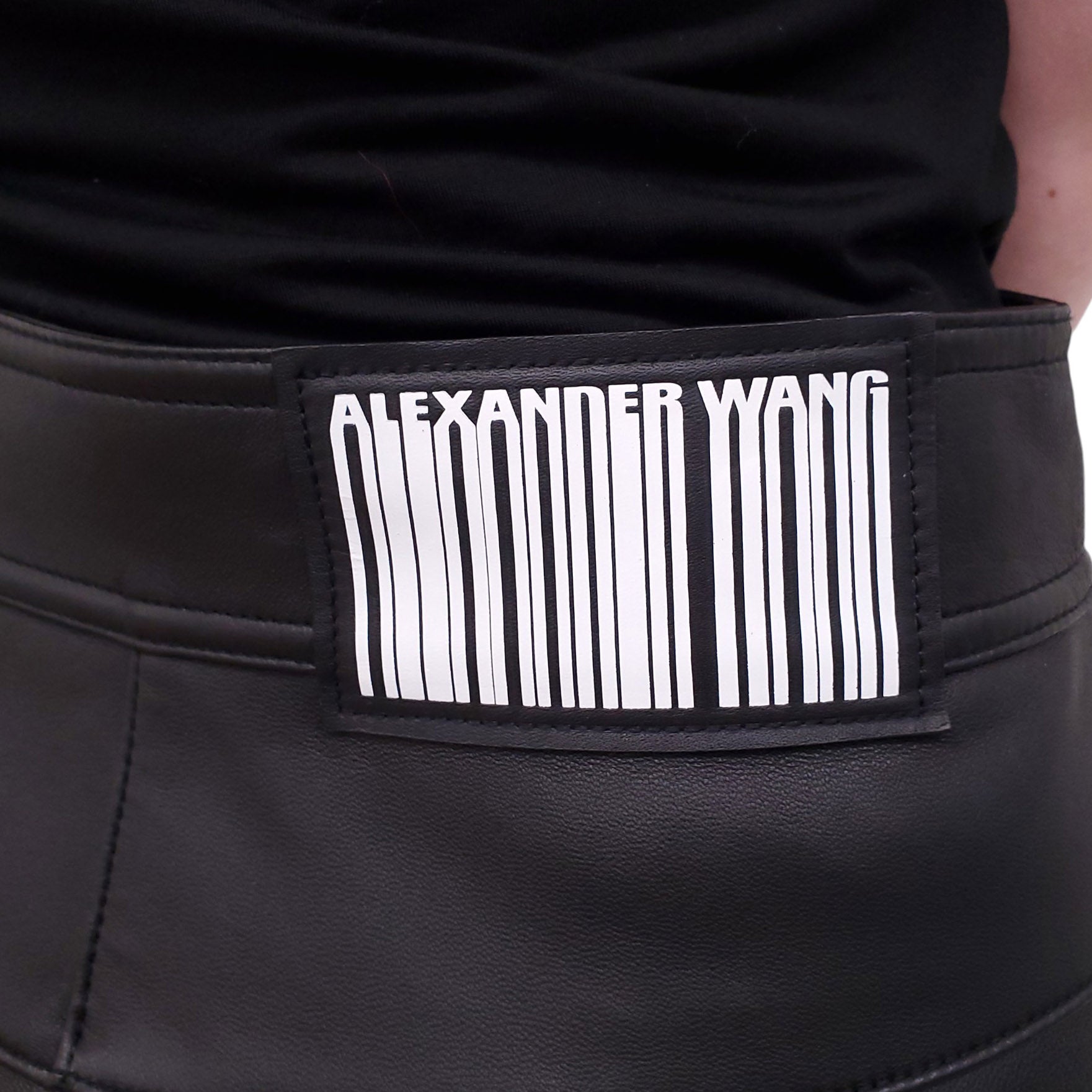 ALEXANDER WANG BLACK LOGO LEATHER PANTS WITH SILVER BUTTONS - SIZE 6