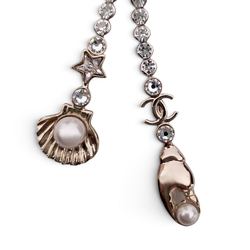CHANEL CRYSTAL BOW BROOCH WITH SEASHELL AND LOBSTER CLAW