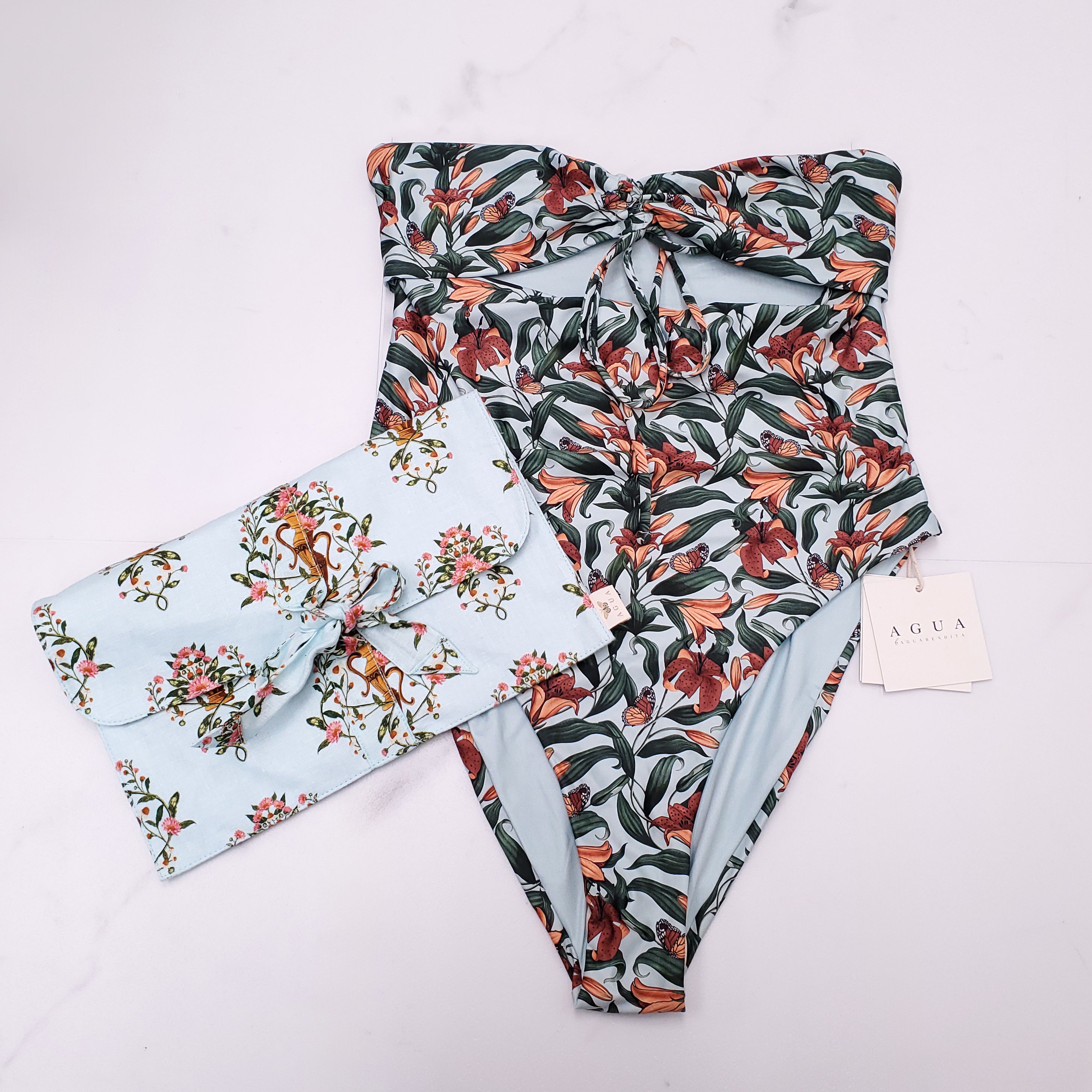 AGUA BY AGUA BENDITA BLUE FLORAL BUTTERFLY PRINT SWIMSUIT WITH CUTOUT DETAIL - SIZE L