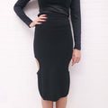 ALAÏA BLACK CUT OUT FITTED MIDI SKIRT - SIZE 42