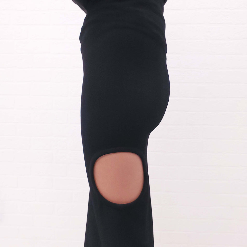 ALAÏA BLACK CUT OUT FITTED MIDI SKIRT - SIZE 42