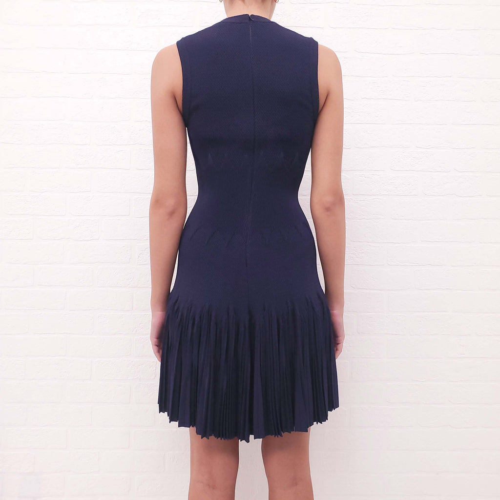 ALAÏA NAVY FITTED PLEATED PEPLUM DRESS - SIZE 38