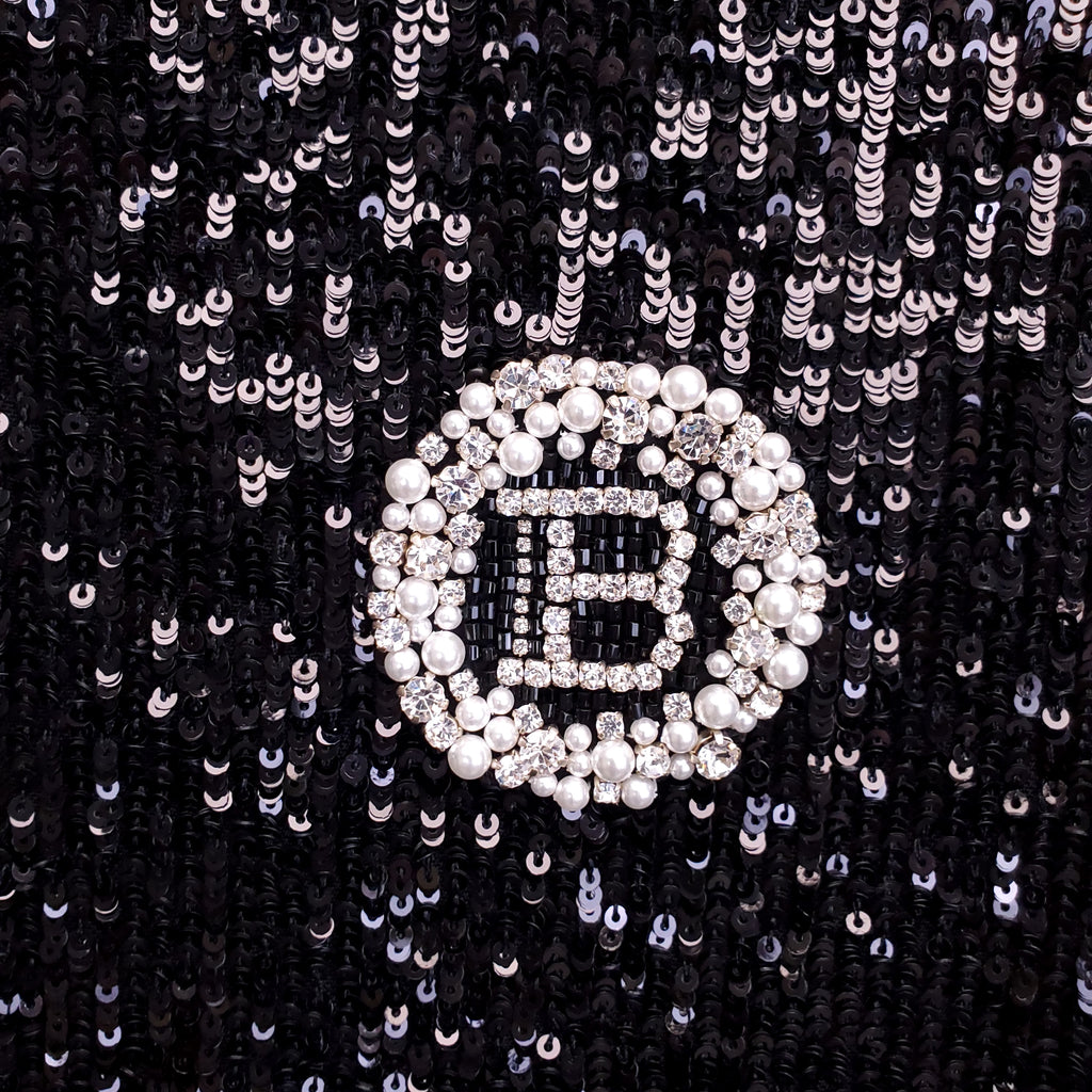 BALMAIN BLACK SEQUIN SHORT SLEEVE POLO WITH CRYSTAL LOGO - SIZE 36