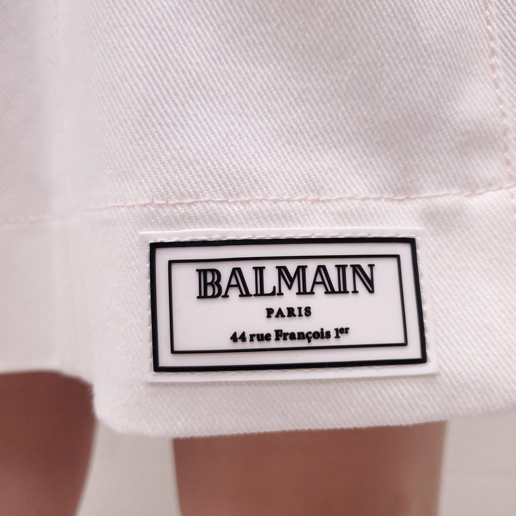 BALMAIN WHITE DENIM MINI SKIRT WITH GOLD LOGO BUTTONS - SIZE 44
