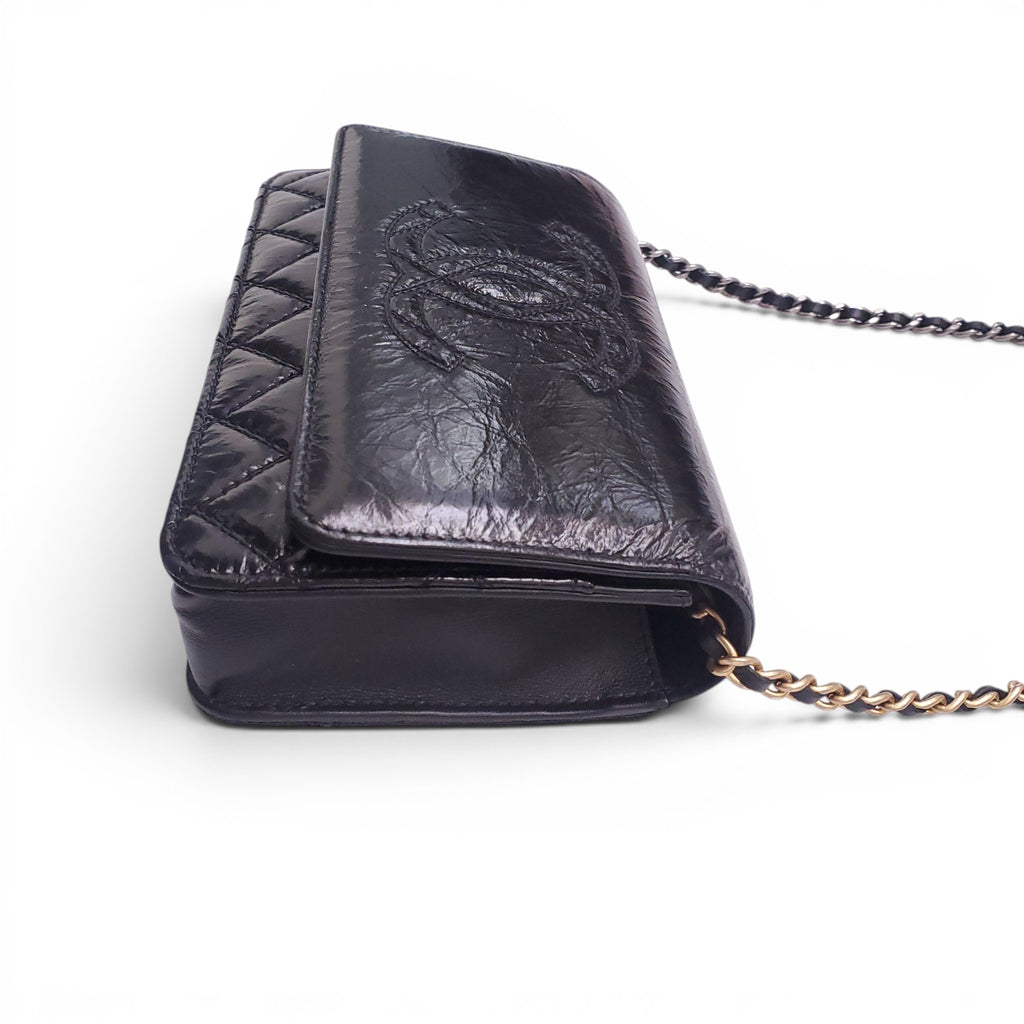 CHANEL BLACK AGED LEATHER WALLET ON MIXED METAL CHAIN