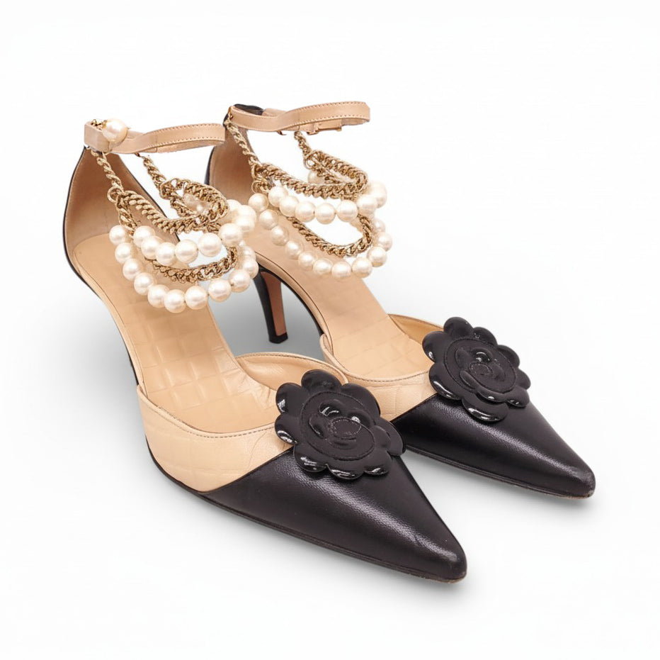 CHANEL BLACK AND NUDE PEARL CHAIN ANKLET HEELS WITH CAMÉLIA DETAIL - SIZE 37.5