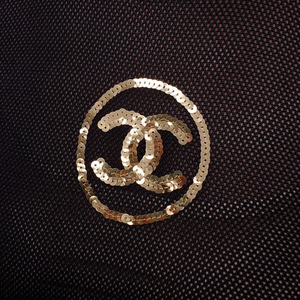 CHANEL BLACK CREWNECK WITH GOLD CC LOGO IN SEQUIN - SIZE 36