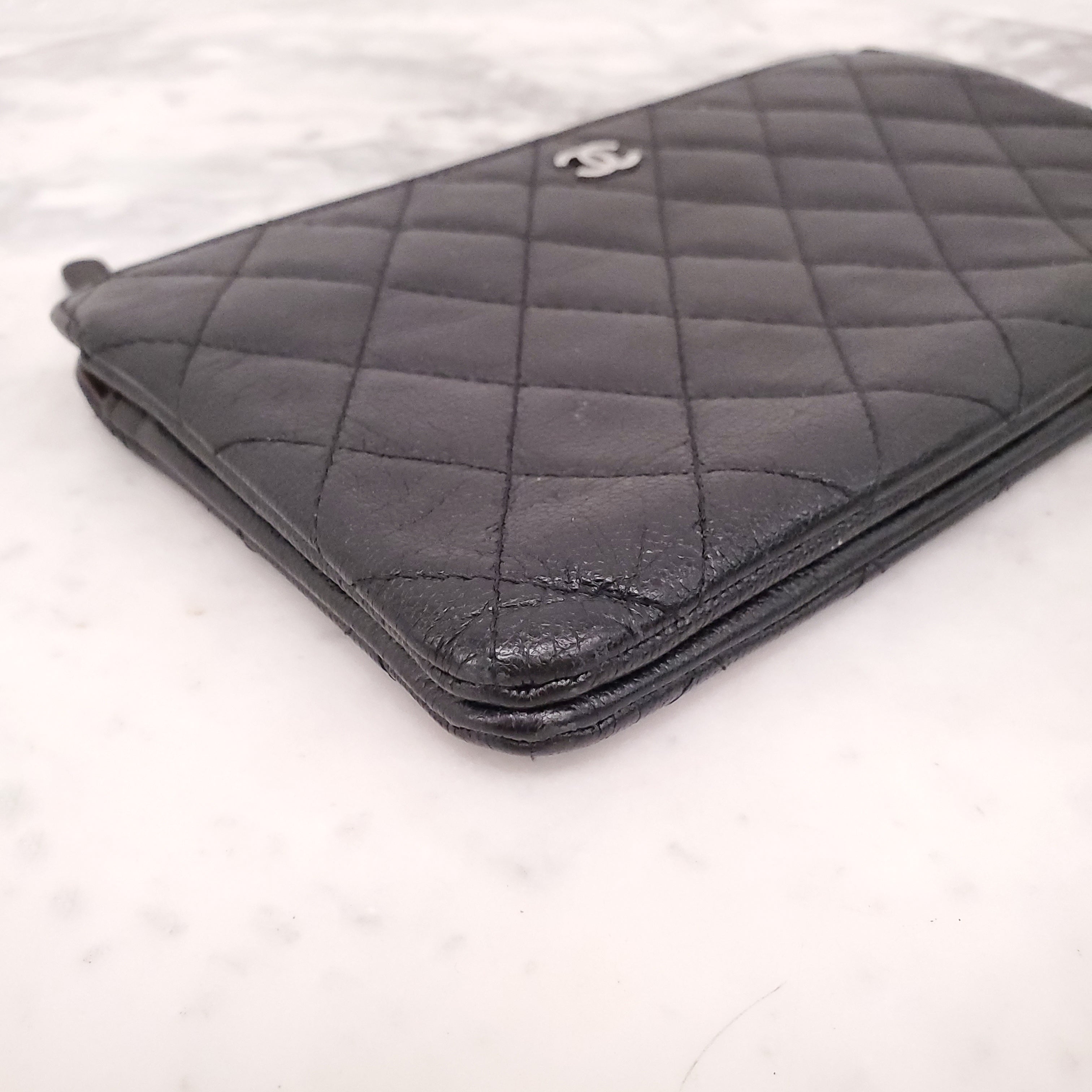 CHANEL BLACK QUILTED LEATHER ZIP WALLET