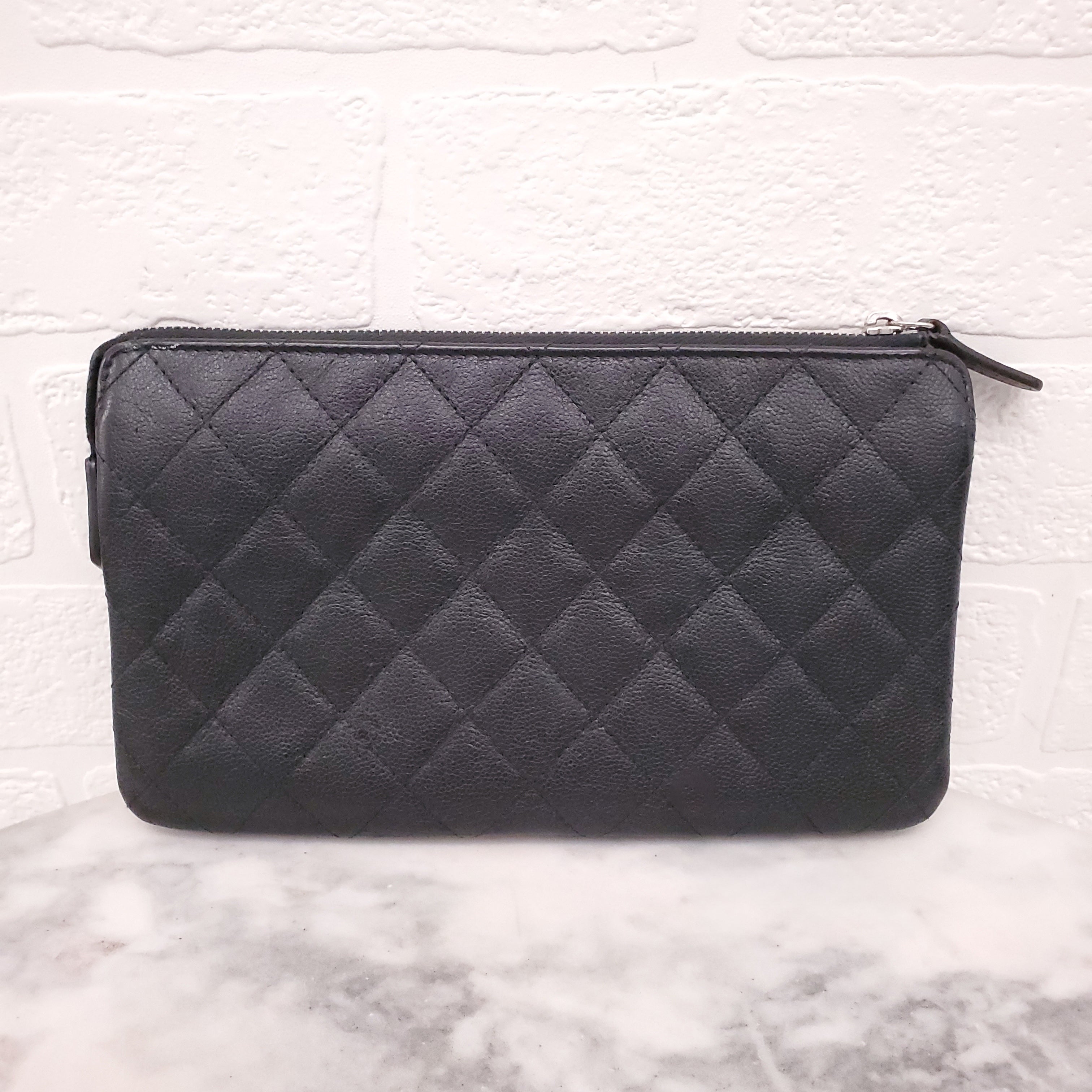CHANEL BLACK QUILTED LEATHER ZIP WALLET