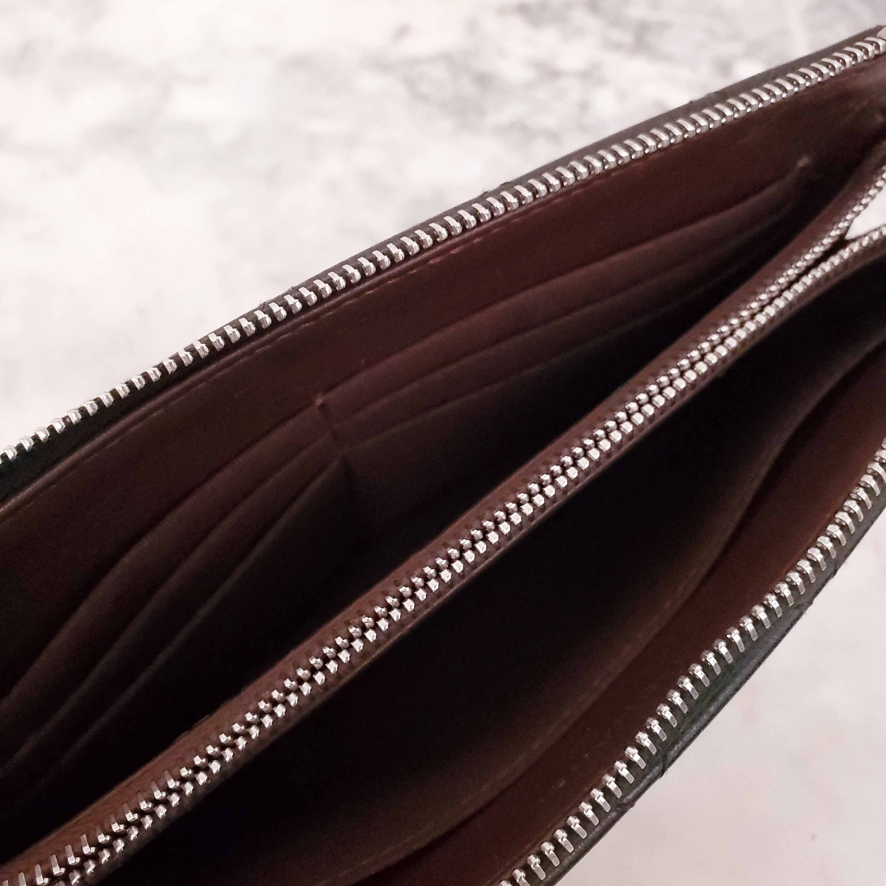 CHANEL BLACK QUILTED LEATHER ZIP WALLET