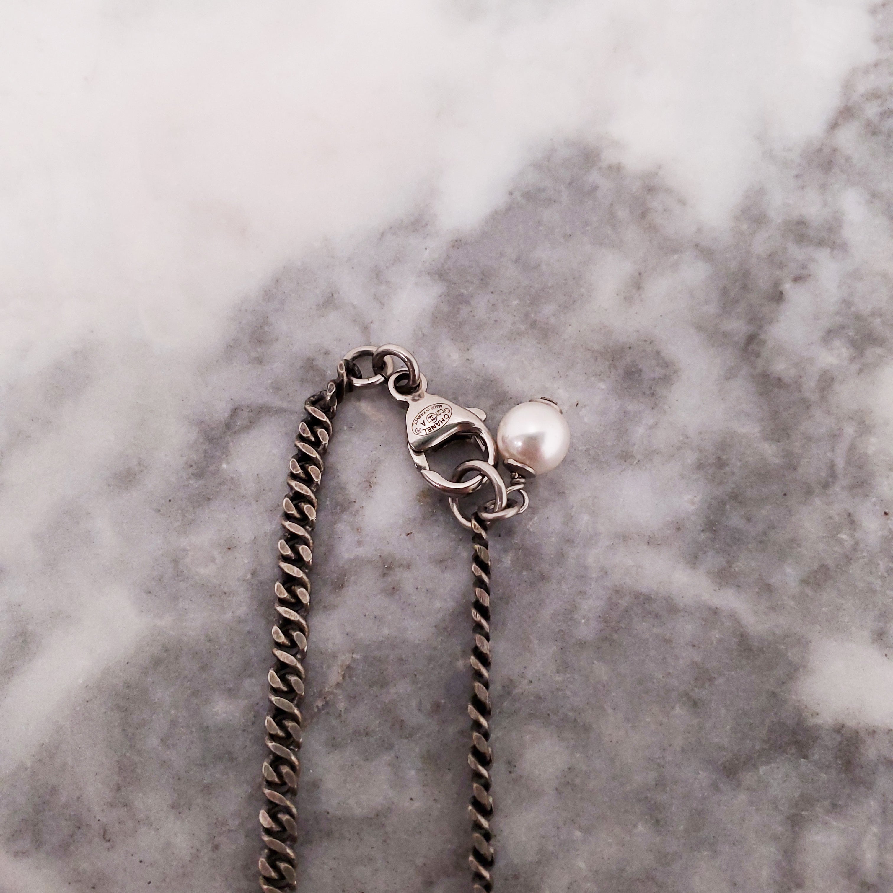 CHANEL CHROME CRYSTAL AND PEARL LOGO ADJUSTABLE NECKLACE