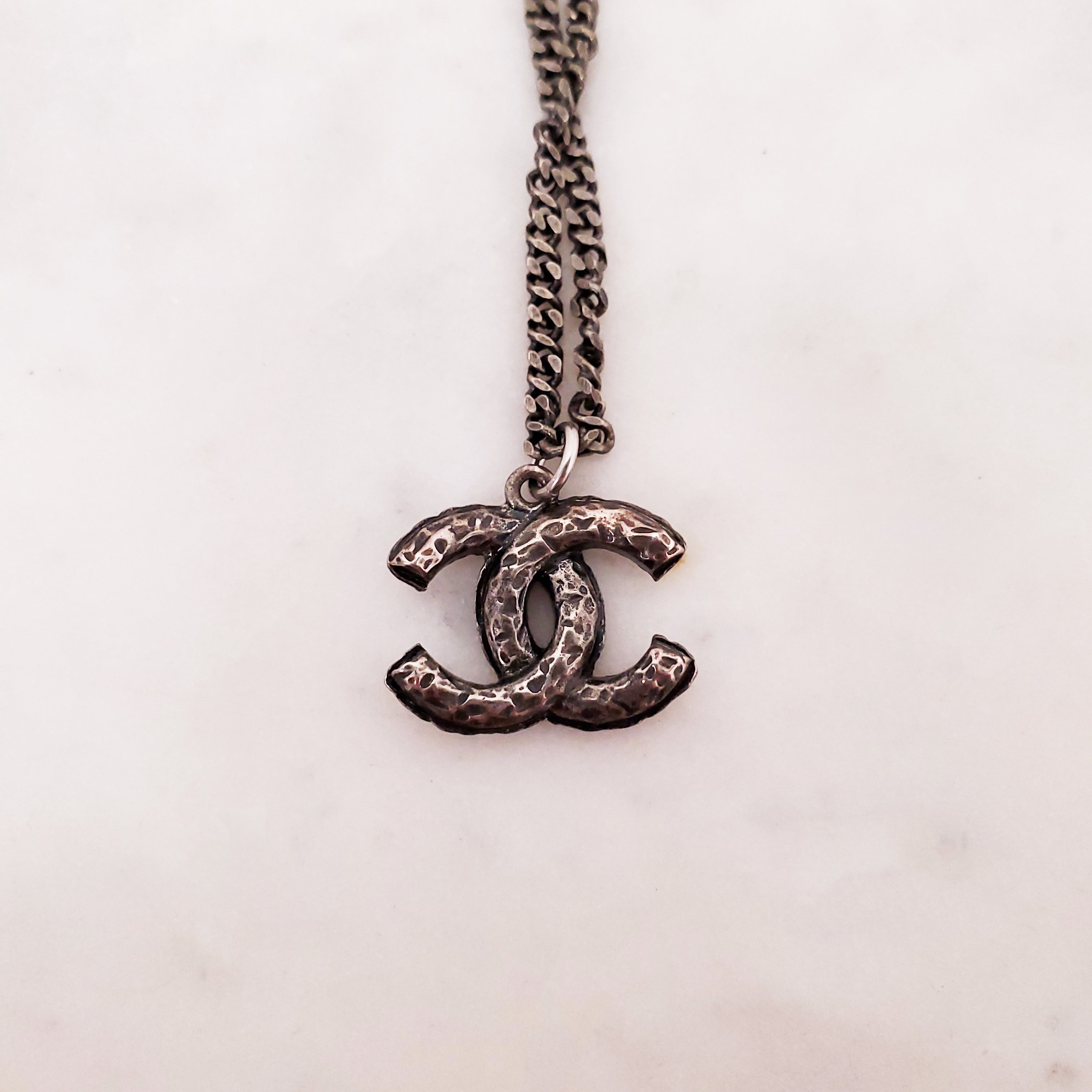 CHANEL CHROME CRYSTAL AND PEARL LOGO ADJUSTABLE NECKLACE