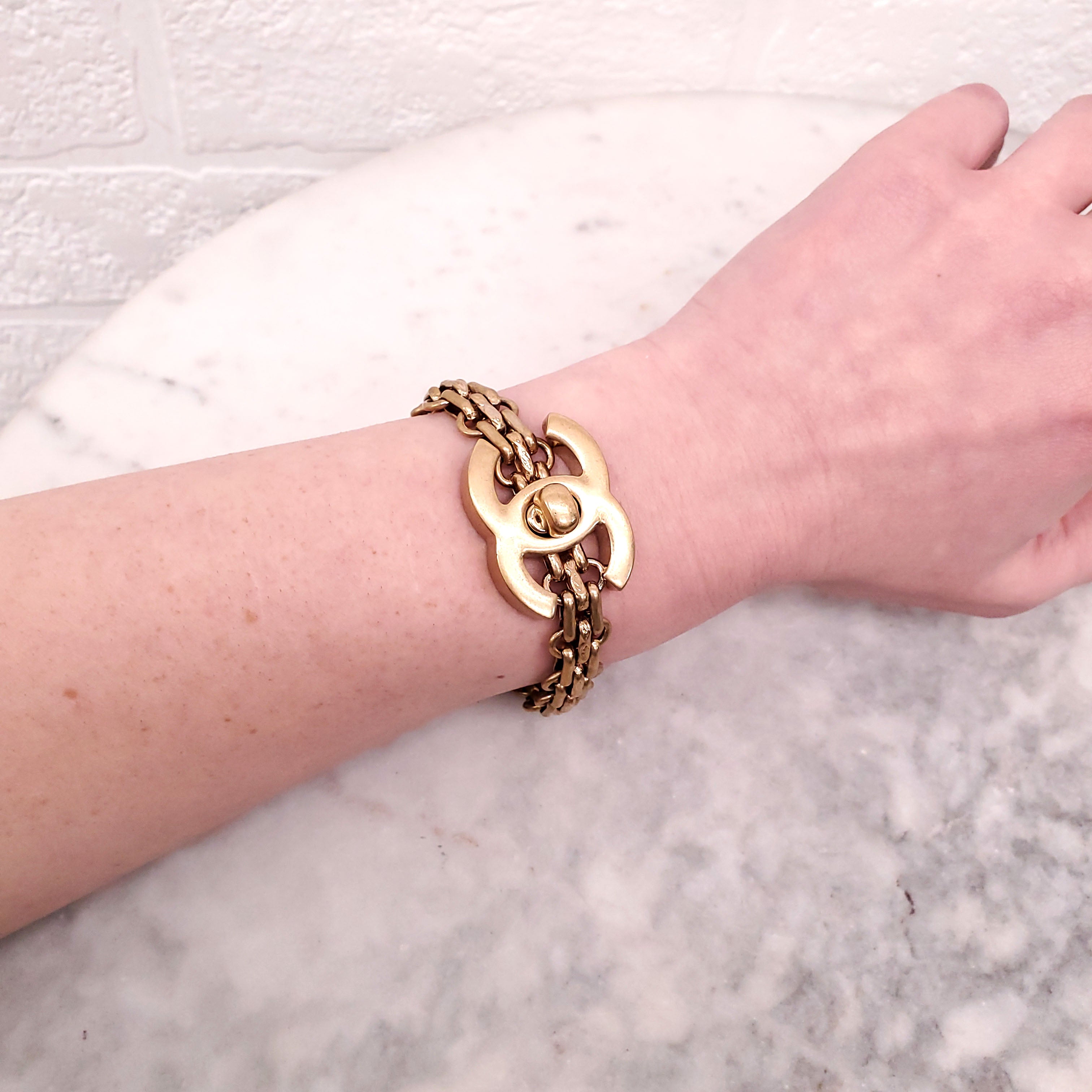 CHANEL GOLD TURNLOCK BRACELET
