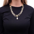 CHANEL LOGO NECKLACE WITH DROP PEARL