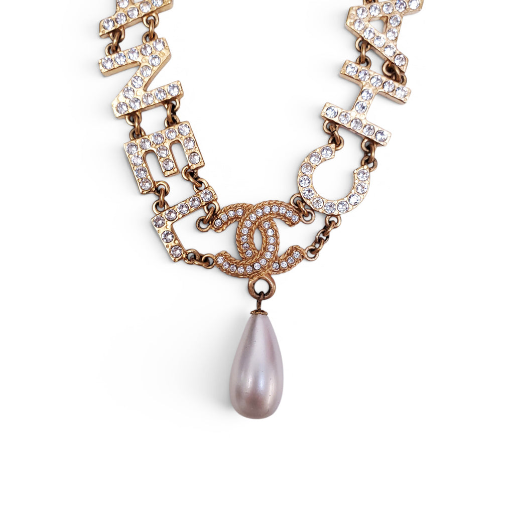 CHANEL LOGO NECKLACE WITH DROP PEARL