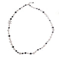 CHANEL PEARL CREAM AND BLACK NECKLACE WITH CRYSTAL DETAIL