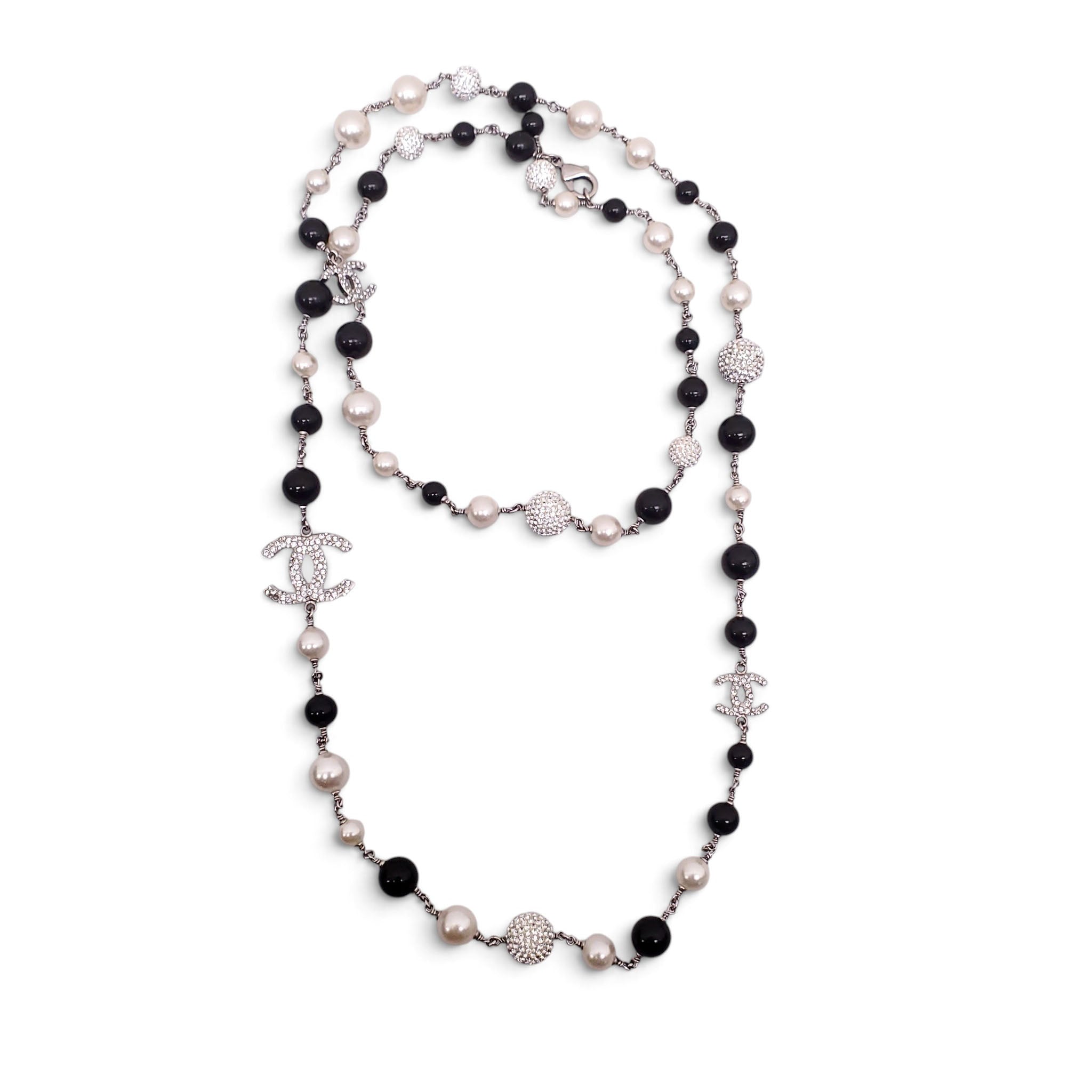 CHANEL PEARL CREAM AND BLACK NECKLACE WITH CRYSTAL DETAIL