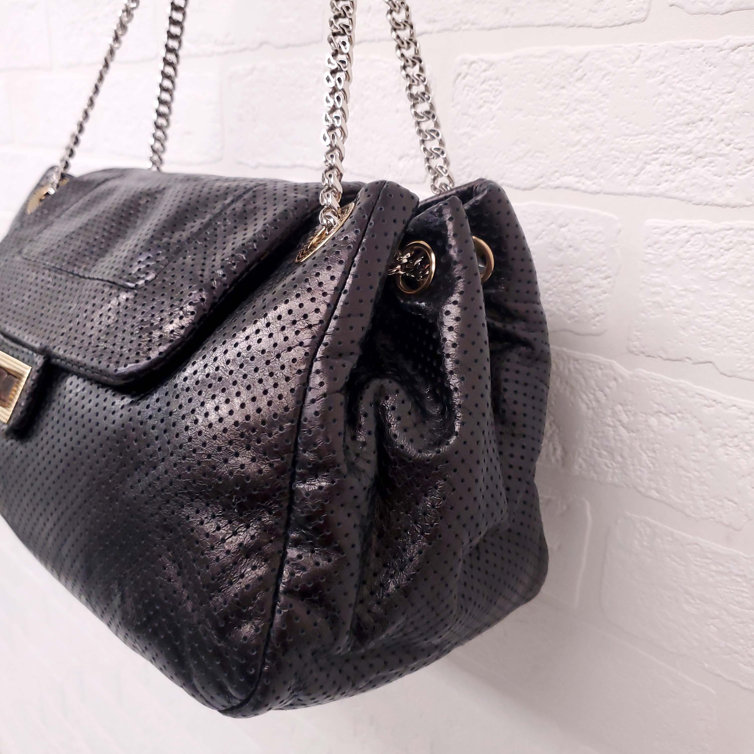 CHANEL PERFORATED DRILL ACCORDION FLAP BAG