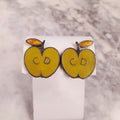 CHRISTIAN DIOR GREEN APPLE EARRINGS WITH 'CD' IN THE CENTRE