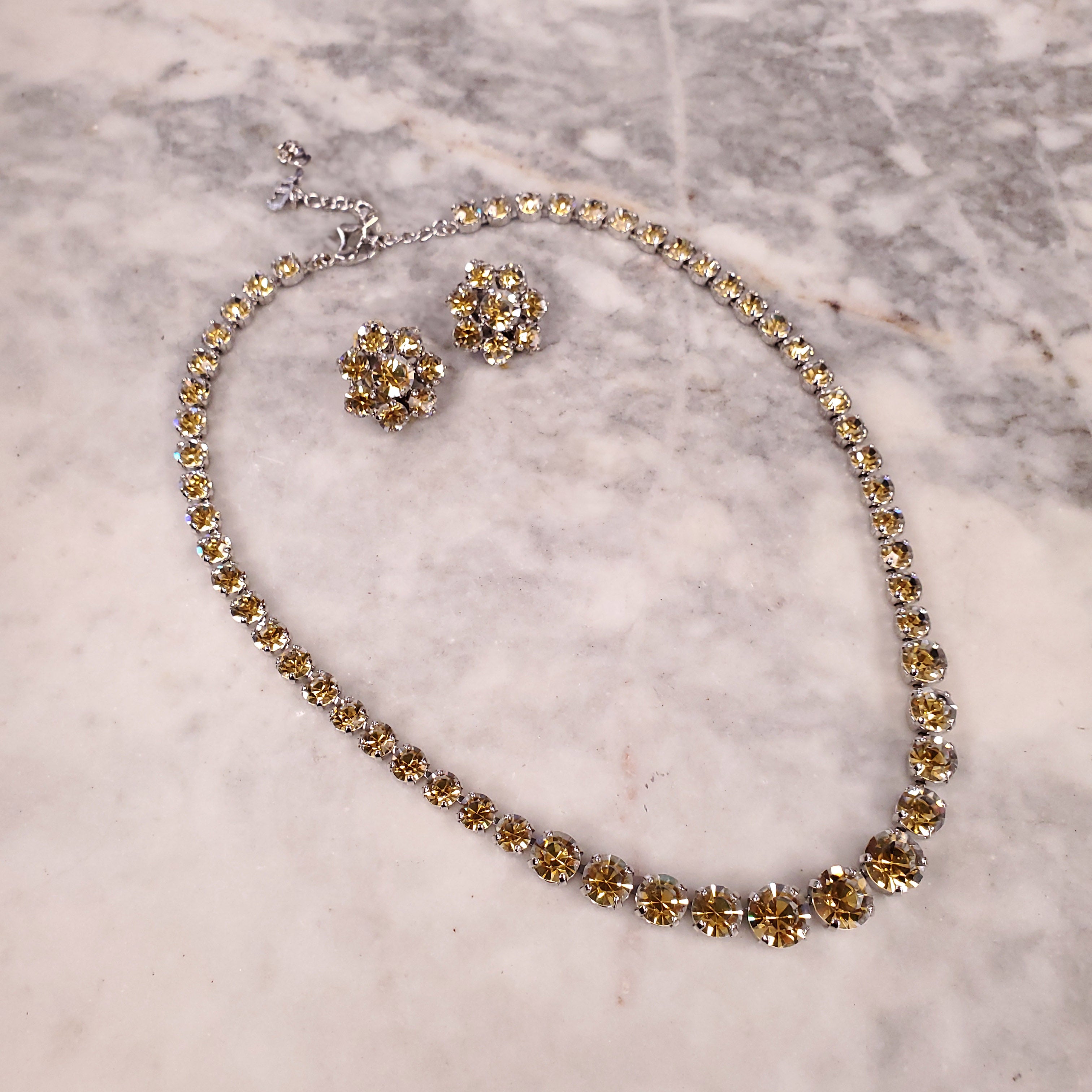 DIOR 1995 NECKLACE WITH SINGLE ROW OF GRADUATED DIORITE STONES SET IN RHODIUM WITH MATCHING EARRINGS