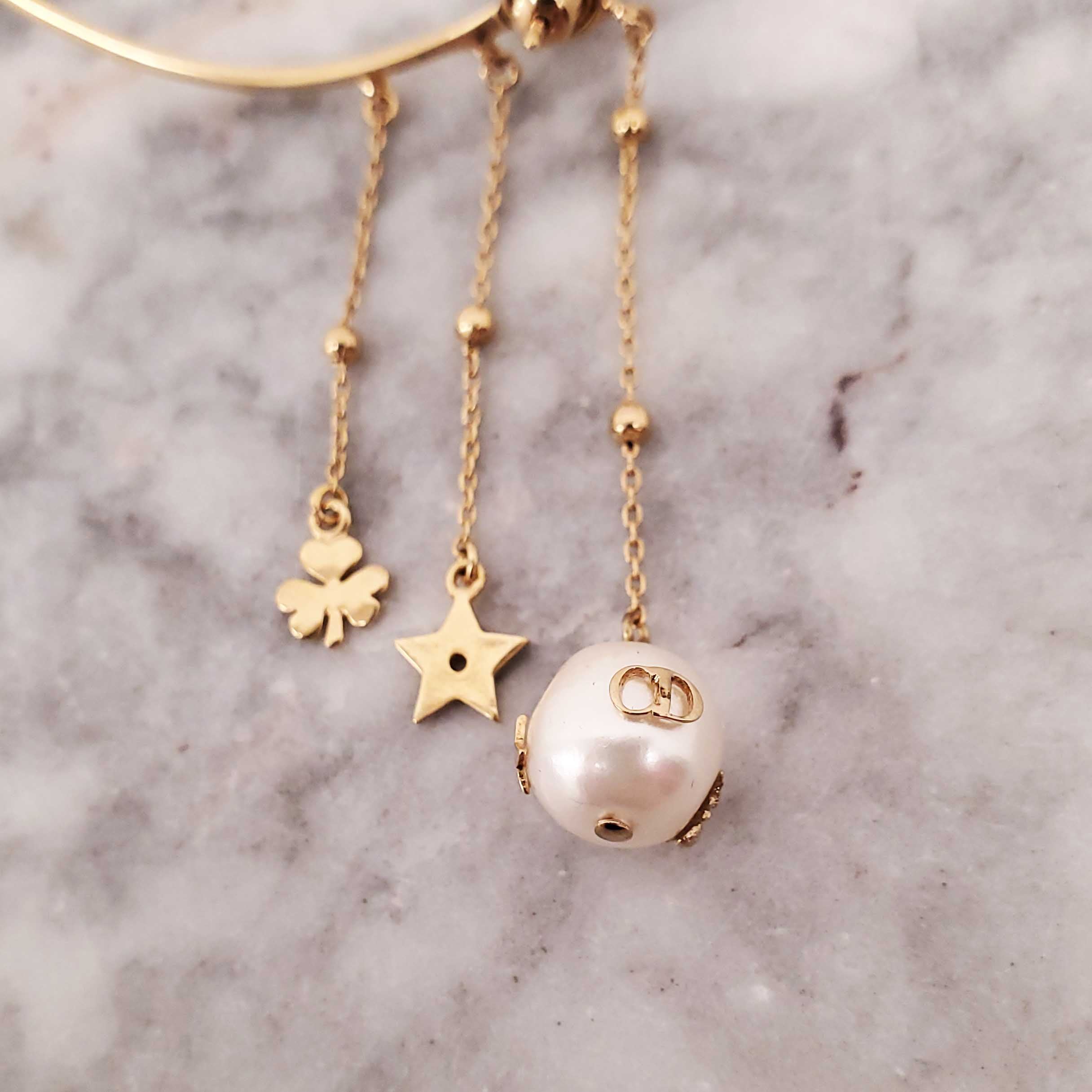 DIOR GOLD PEARL DANGLING EAR CUFF