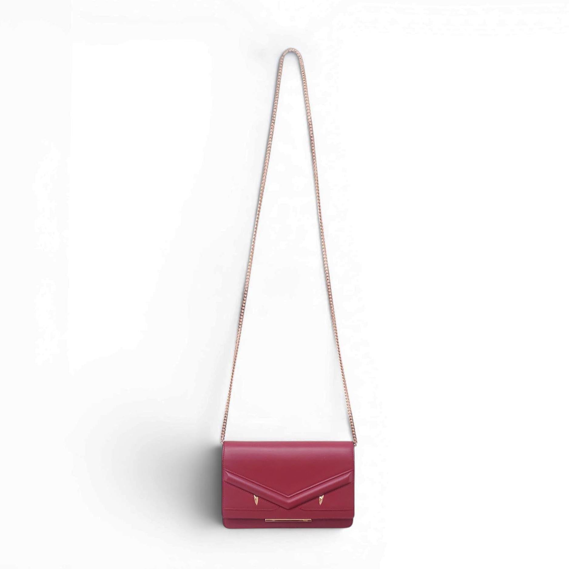 FENDI RED LEATHER MONSTER WALLET ON CHAIN