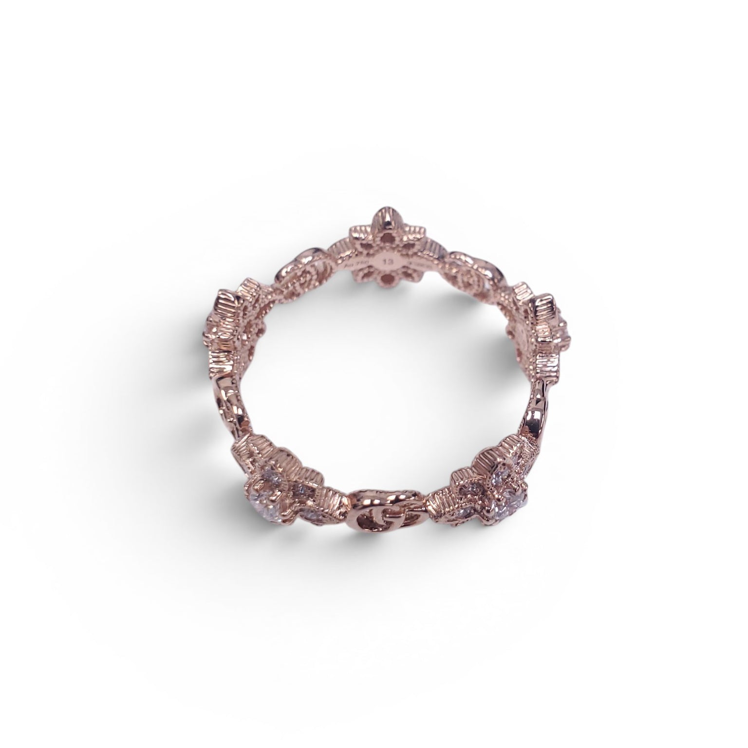 GUCCI 18K GOLD AND DIAMOND FLORAL LOGO RING