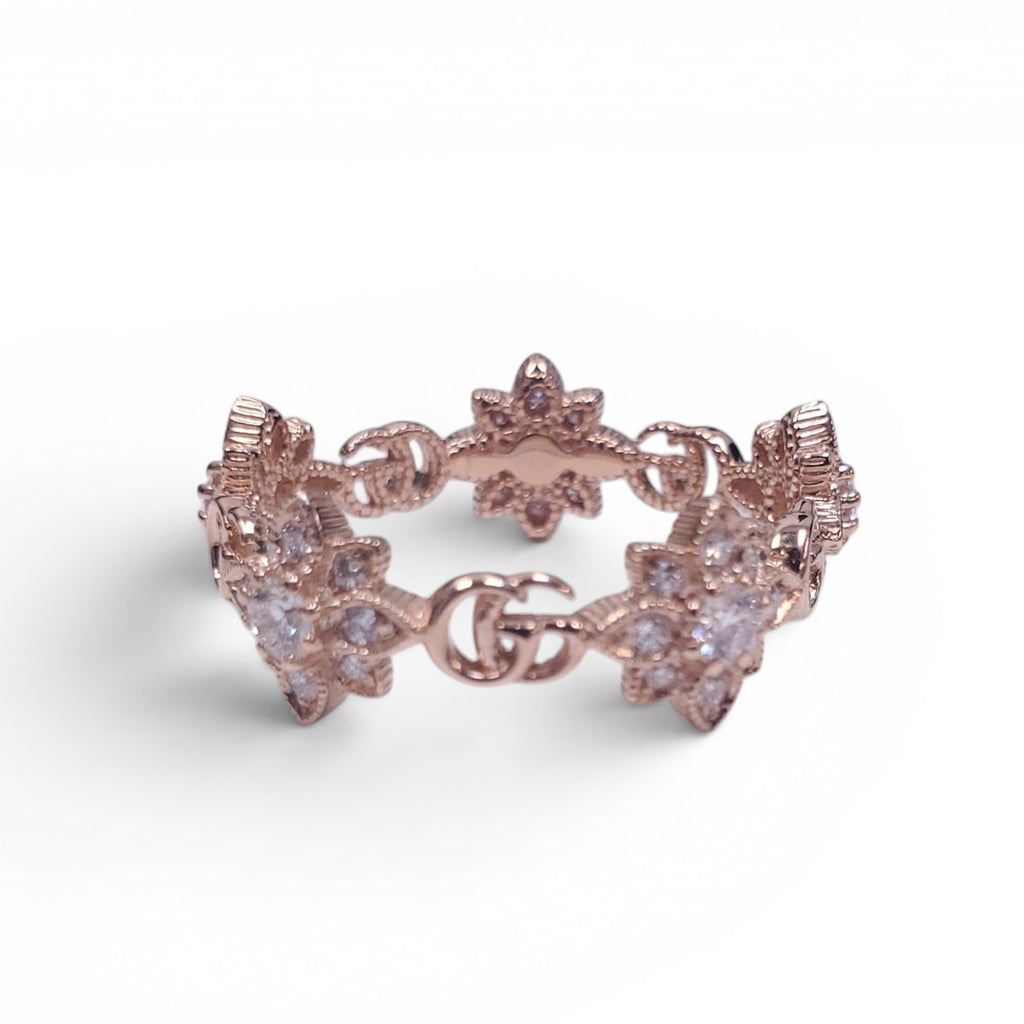 GUCCI 18K GOLD AND DIAMOND FLORAL LOGO RING
