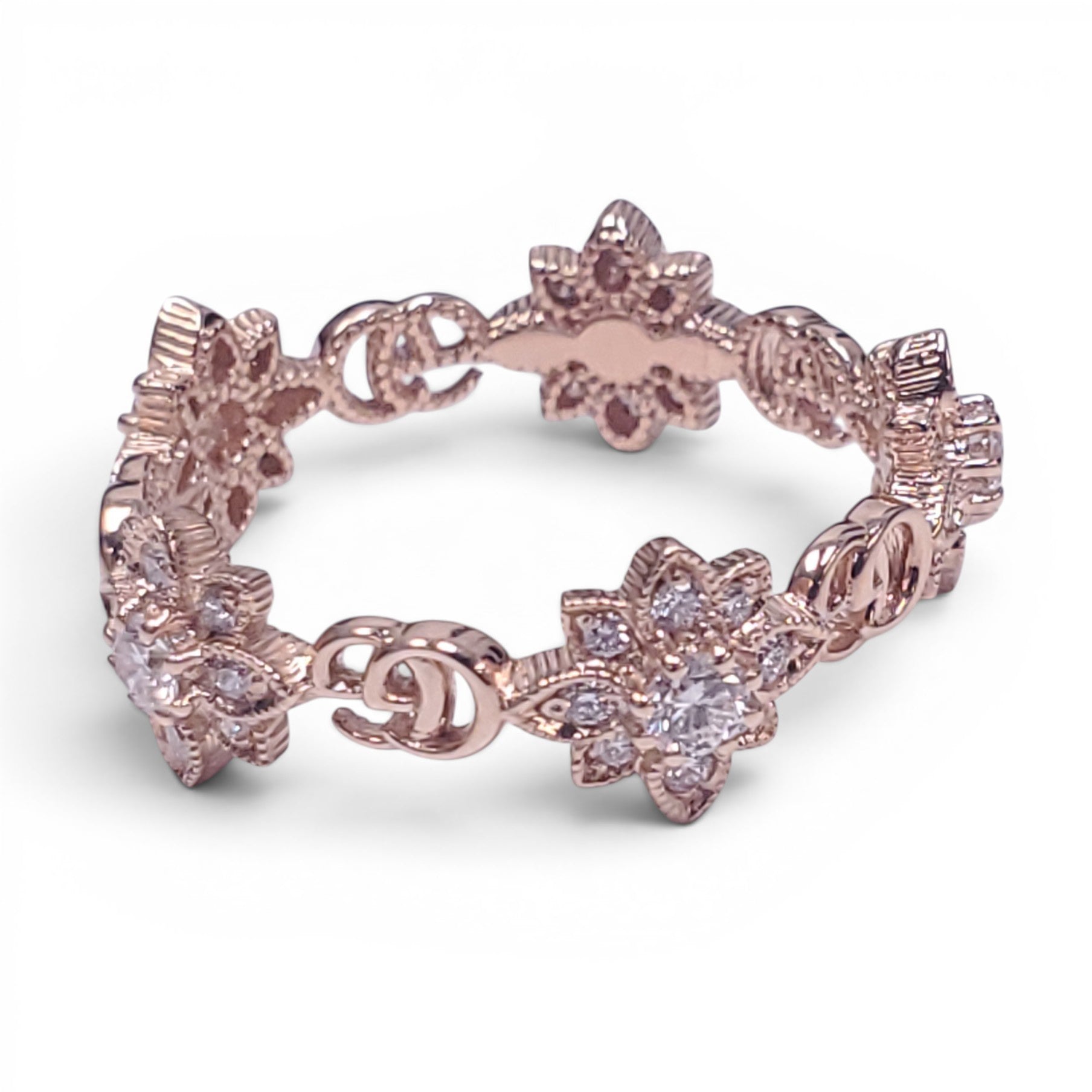 GUCCI 18K GOLD AND DIAMOND FLORAL LOGO RING