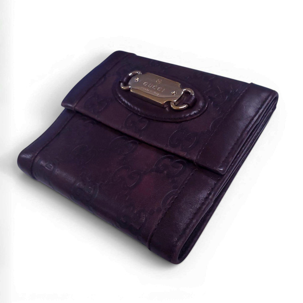 GUCCI BROWN LEATHER MONOGRAM EMBOSSED WALLET
