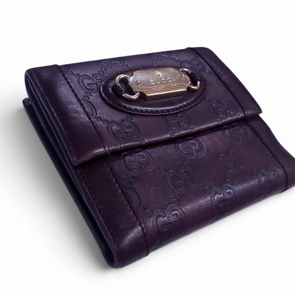 GUCCI BROWN LEATHER MONOGRAM EMBOSSED WALLET