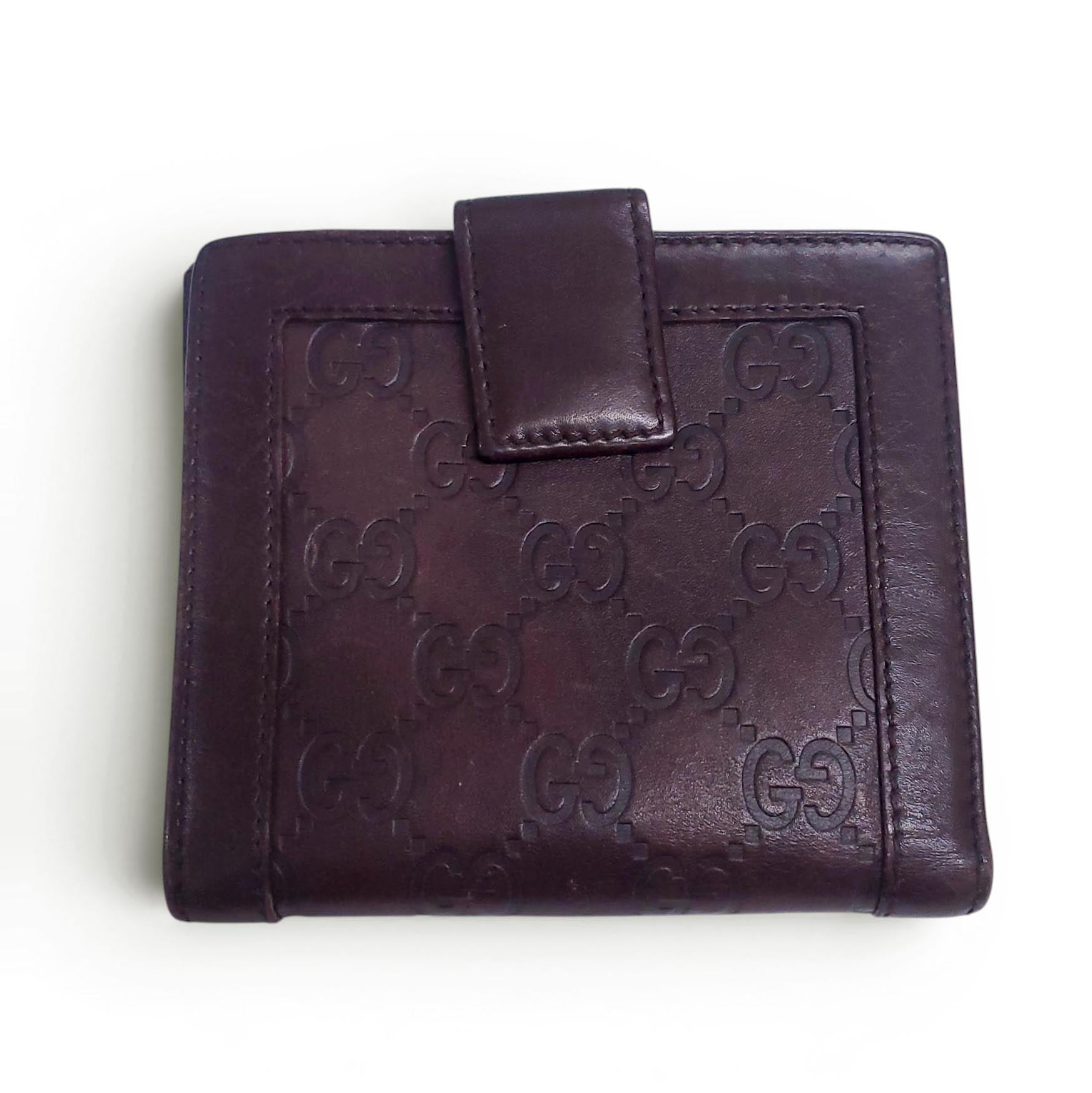 GUCCI BROWN LEATHER MONOGRAM EMBOSSED WALLET
