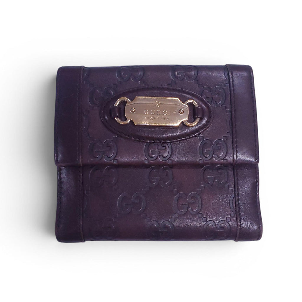 GUCCI BROWN LEATHER MONOGRAM EMBOSSED WALLET