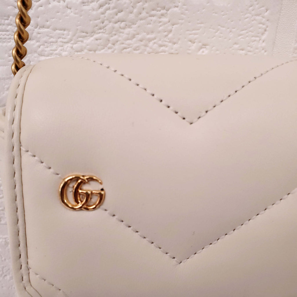 GUCCI GG MARMONT SMALL SHOULDER BAG IN IVORY WITH GG GOLD LOGOS