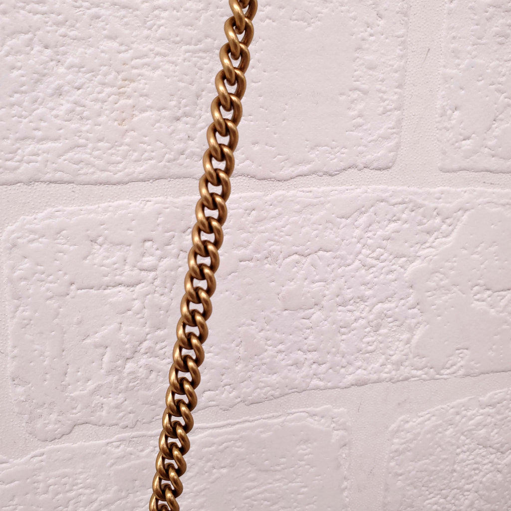 GUCCI GG MARMONT SMALL SHOULDER BAG IN IVORY WITH GG GOLD LOGOS