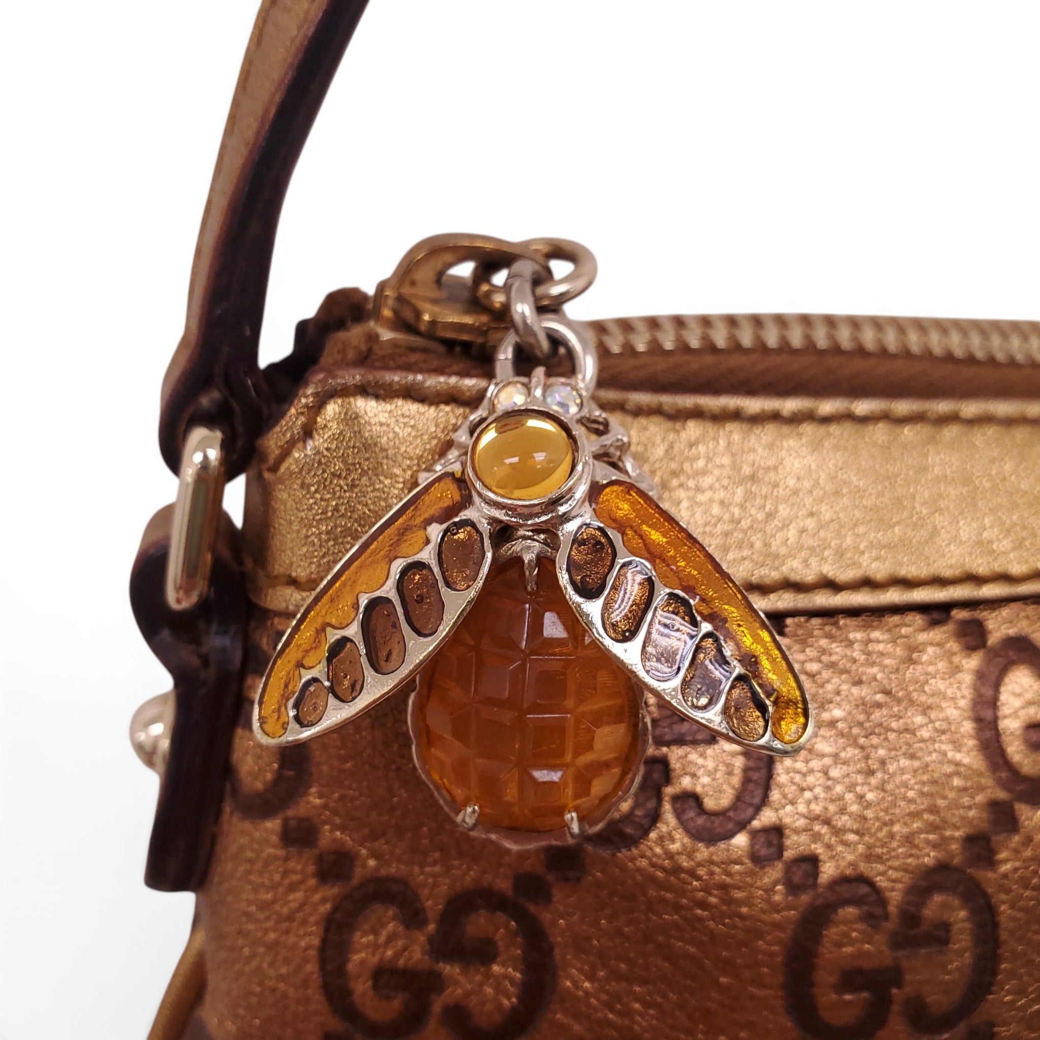 GUCCI GOLD MONOGRAM POUCHETTE BAG