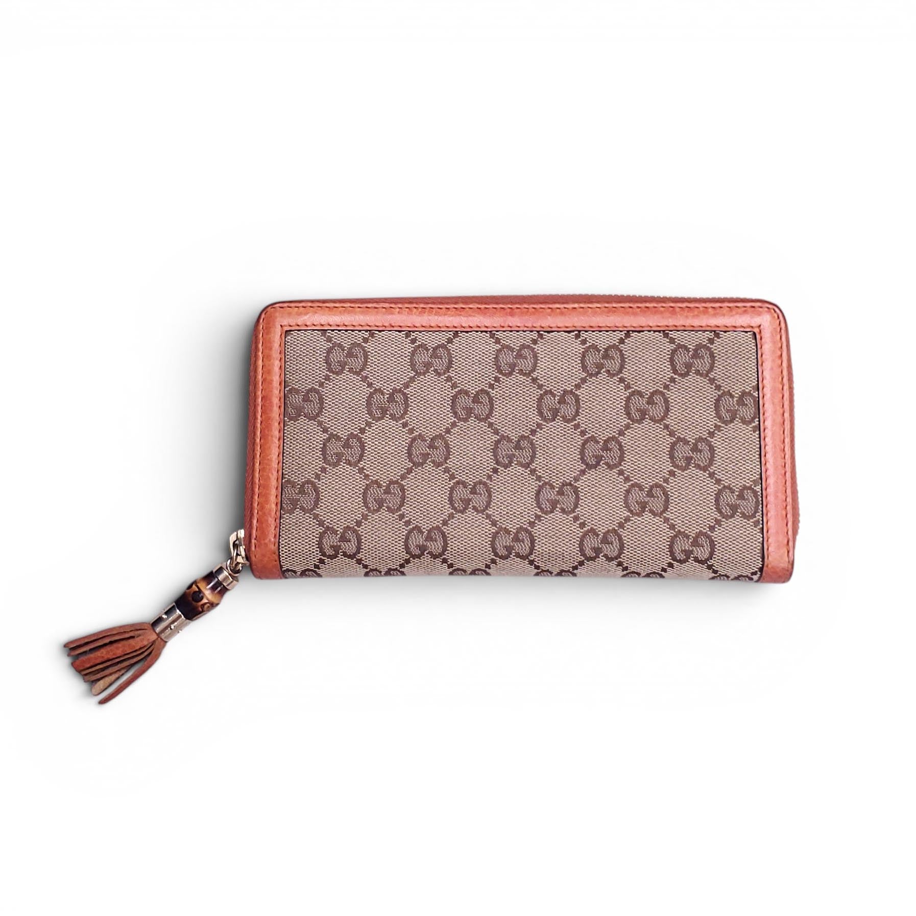 GUCCI MONOGRAM ZIP AROUND WALLET WITH BAMBOO TASSEL DETAIL