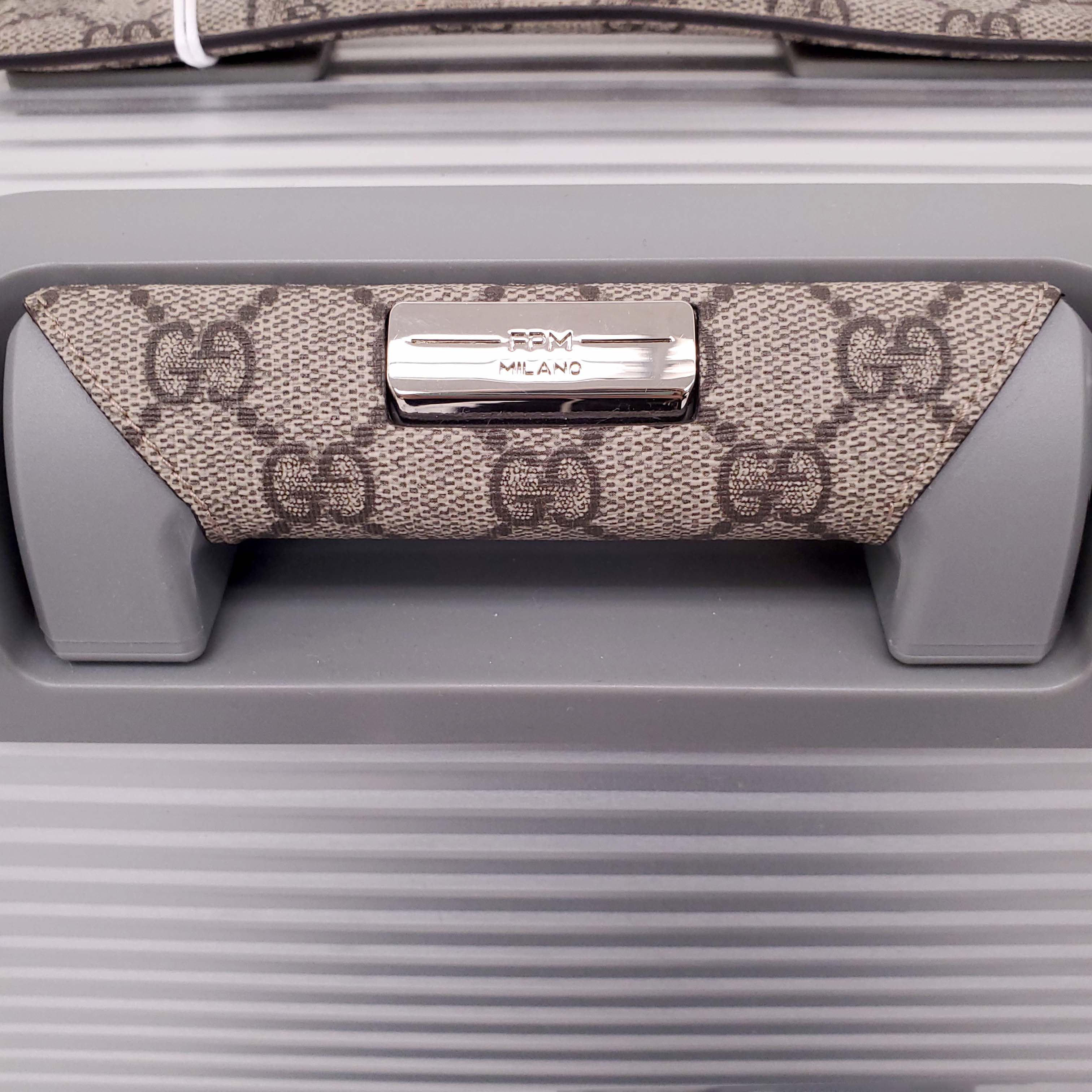 GUCCI SILVER LUGGAGE