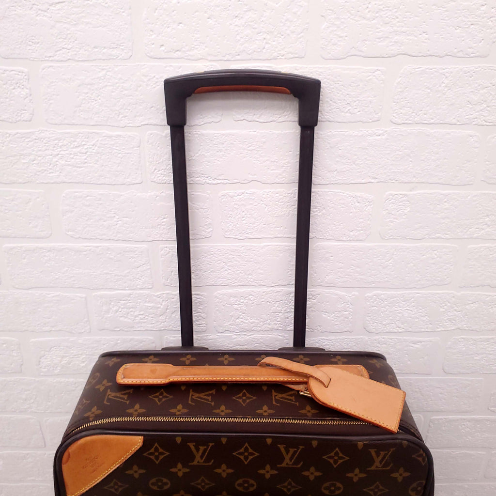 LOUIS VUITTON MONOGRAM ROLLING CARRY ON SUITCASE