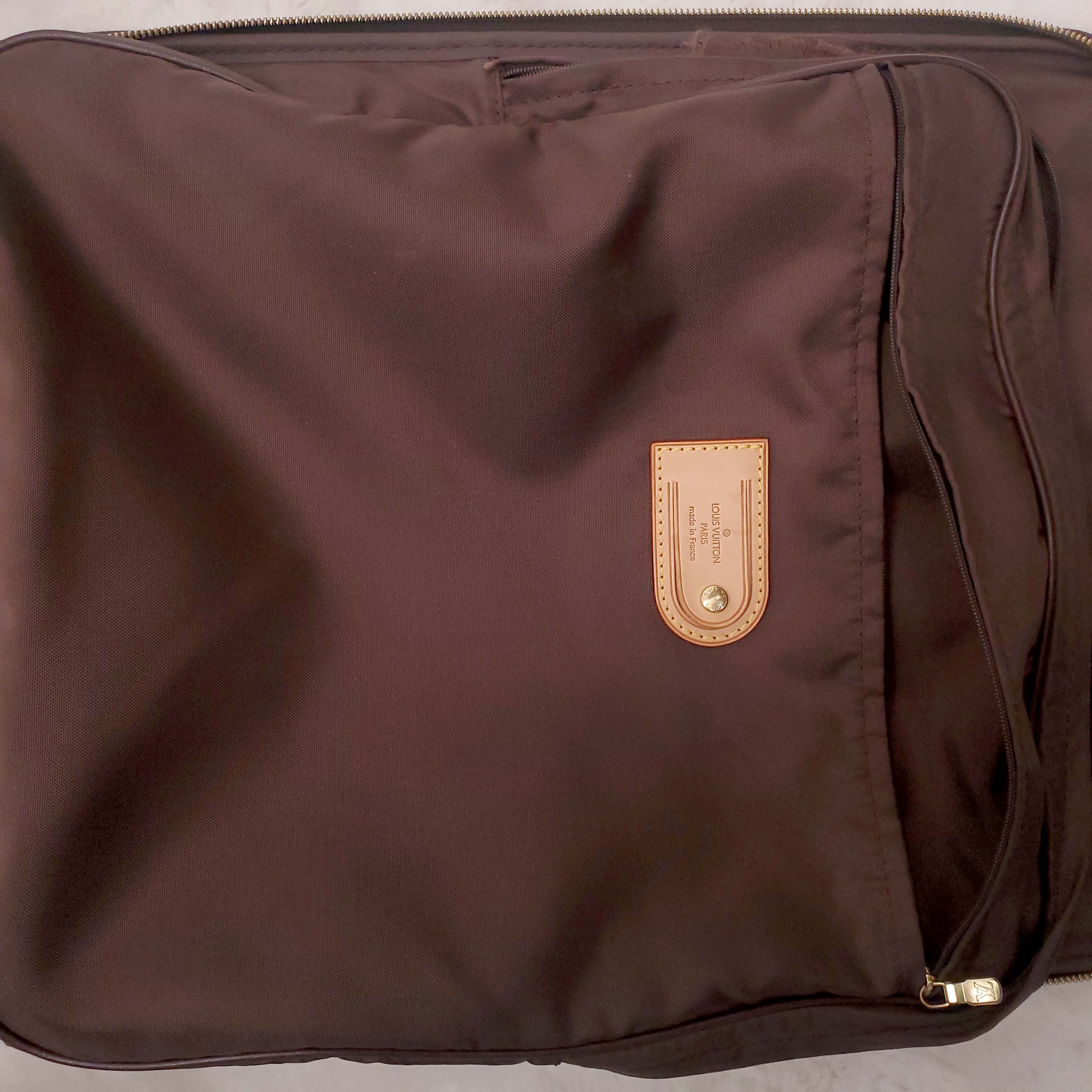 LOUIS VUITTON MONOGRAM ROLLING CARRY ON SUITCASE