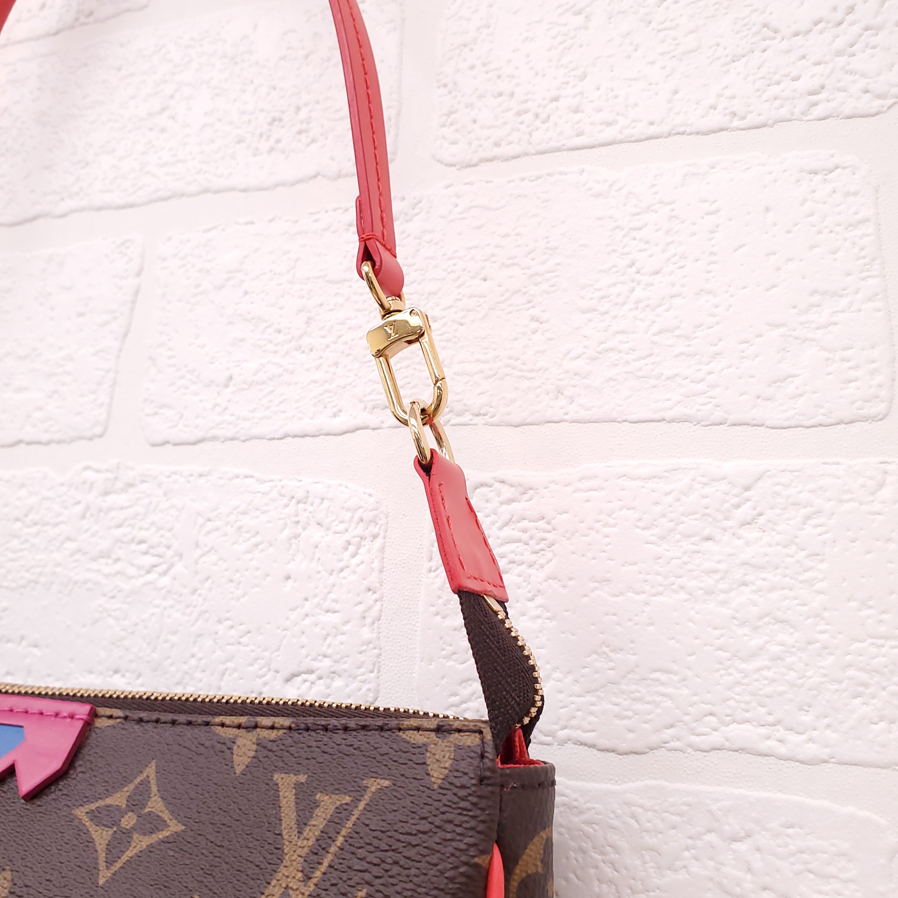 LOUIS VUITTON MONOGRAM 'TOTEM POCHETTE ACCESSORIES' BAG