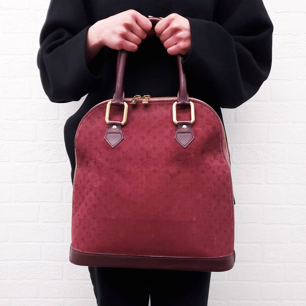LOUIS VUITTON VINTAGE BURGUNDY MONOGRAM 'ALMA' BAG